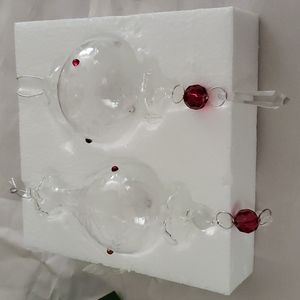 NWT, Crystal Etched,Small  3 Red Crystals around each. 1 globe,1 hurricane shape